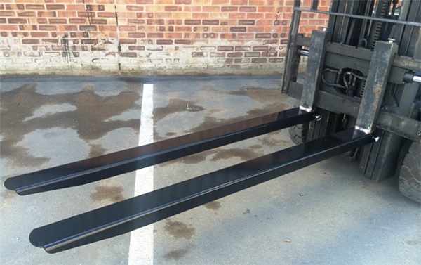 Fork extensions on a forklift truck